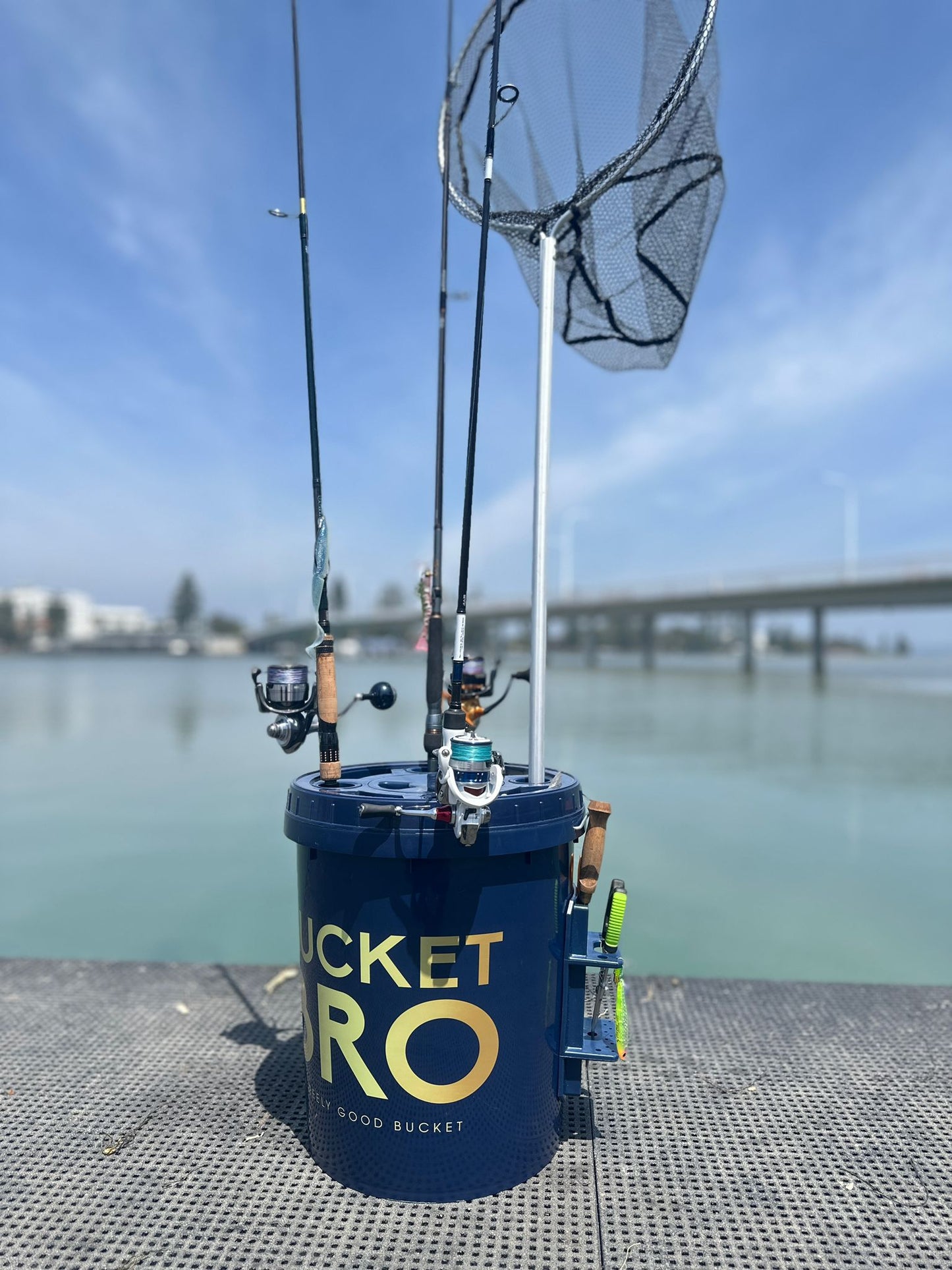 Bucket Bro fishing bucket in use on the water with rods loaded